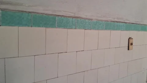 Tiled wall surface showing vintage texture in panning motion video footage Stock Footage 339248155