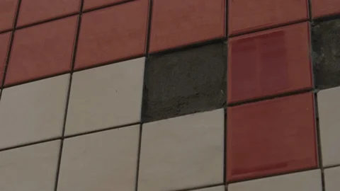 The tiler lays the tiles Stock Footage 112122789