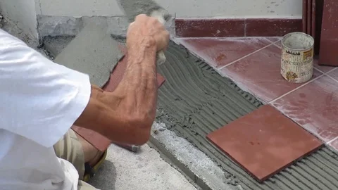 Tiler which restores the laying of the sidewalk Stock Footage 101972972