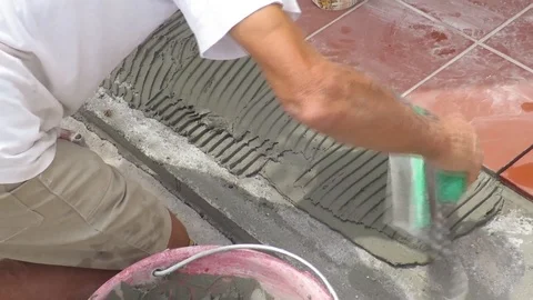 Tiler which restores the laying of the sidewalk Stock Footage 101972974
