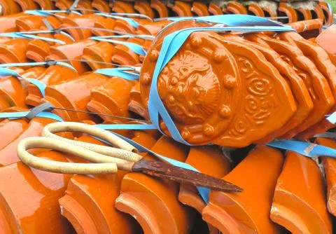 Tiles and scissors Stock Photos