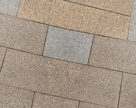 Tiles brown and gray rectangular, background stone tilted close-up 스톡 사진