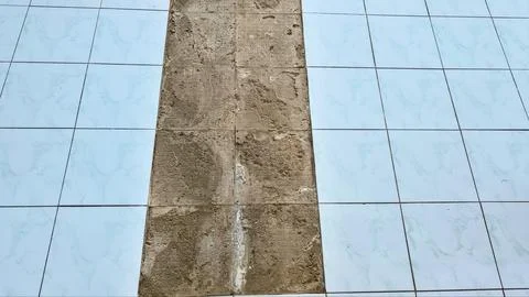 Tiles falling off the floor Stock Photos