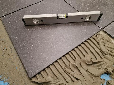 Tiles installation process in progress Foto stock