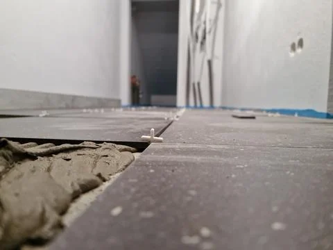 Tiles installation process in progress Stock Photos