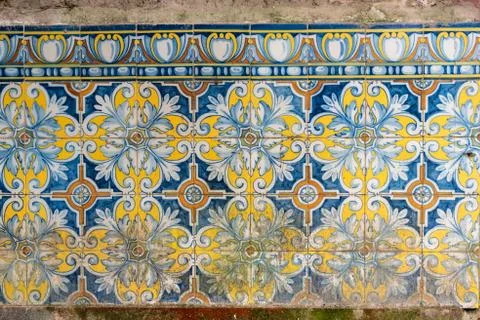 Tiles pattern of flowers with different colors like white, yellow and blue Stock Photos