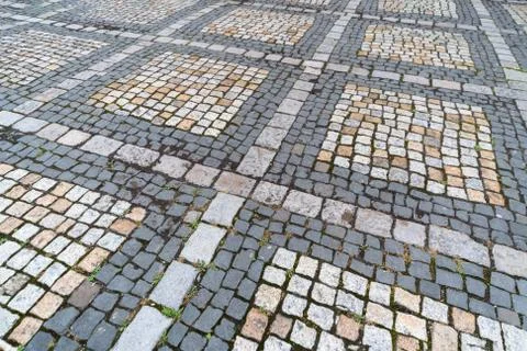 Tiles texture. Pattern of ancient german cobblestone in city downtown. Little Stock Photos