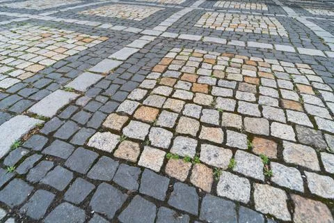 Tiles texture. Pattern of ancient german cobblestone in city downtown. Little Foto stock