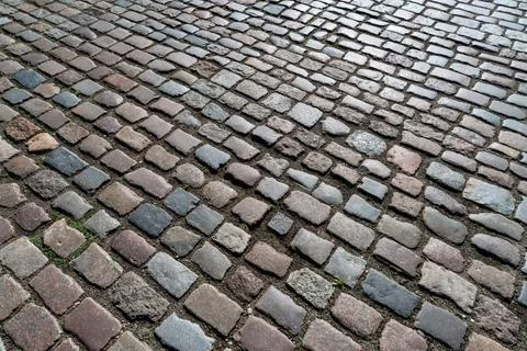 Tiles texture. Pattern of ancient german cobblestone in city downtown. Little 스톡 사진