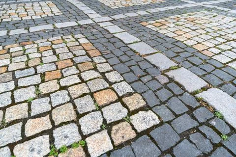 Tiles texture. Pattern of ancient german cobblestone in city downtown. Little Foto stock