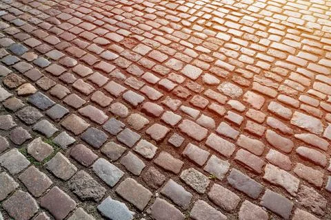 Tiles texture. Pattern of ancient german cobblestone in city downtown. Little Foto stock