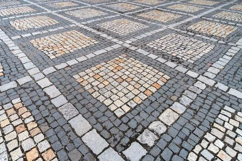 Tiles texture. Pattern of ancient german cobblestone in city downtown. Little Stockfoto's