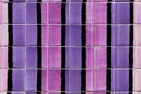 Tiles on the wall of a building with expressive patterns Foto stock