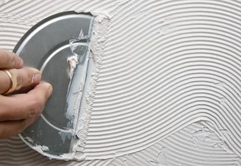 Tiling adhesive Stock Photos