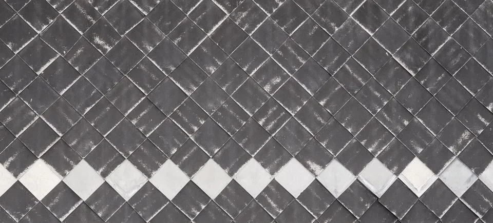 Tiling of wall with plastic material. Old weathered. texture background Stock Photos