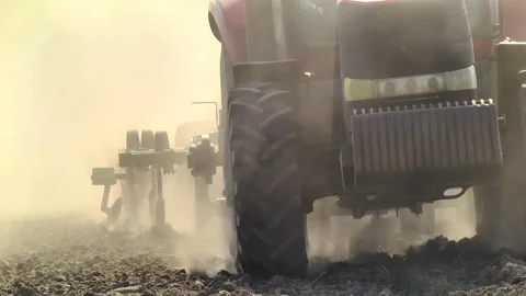 Tillage in the field with a tractor with a machine Stock Footage 147041416