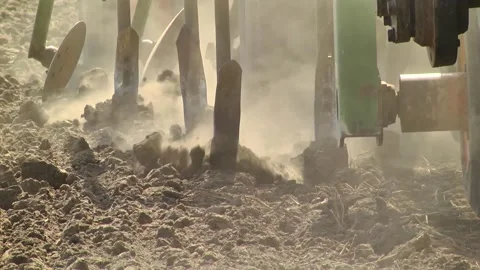 Tillage in the field with a tractor with a machine Stock Footage 147041418