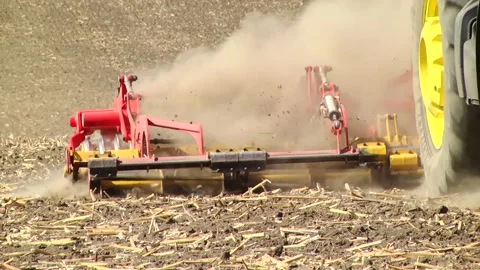Tillage in the field with a tractor with a machine Stock-Footage 147041430