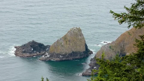 Tillamook Rock, a sea stack 1.2 miles off the Oregon coast, known for housing th Stock Footage 309289452