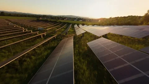 Tilled Austrian Terrain with Solar Panel Array and Long Shadows Stock Footage 310815288