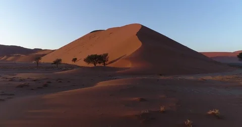 Tilt up aerial view of  one of the vast sand dunes in the Namib desert Stock Footage 78201741