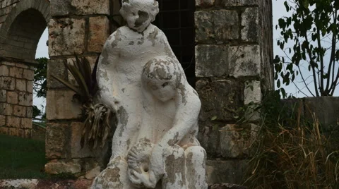 Tilt up-Aging statues and stone structure Columbus Park, Jamaica Stock Footage 58275460