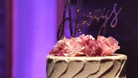 Tilt up Always cake topper move away from cake Stock-Footage 114186020