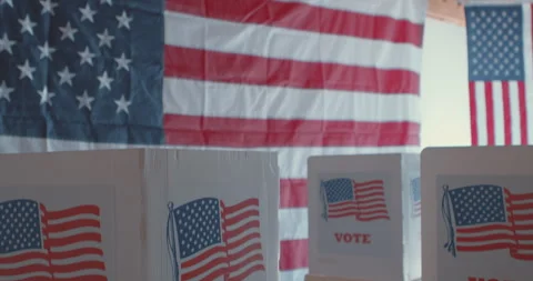 Tilt up and down of American flags and voting booths without people Stock Footage 274910430