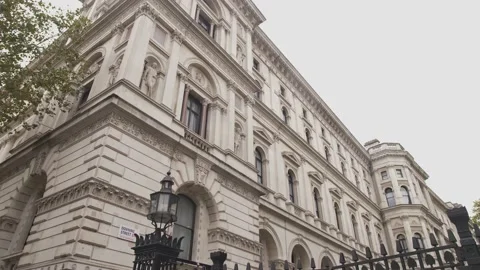 Tilt up and down from Downing street building to security 4K Stock Footage