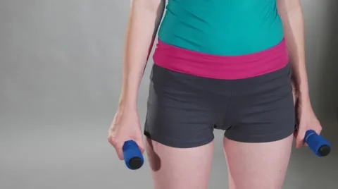 Tilt up and down, portrait of young women hitting the gym Stock Footage 62470307