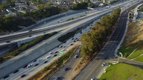 Tilt up and over on the 10 freeway Stock Footage 84784179