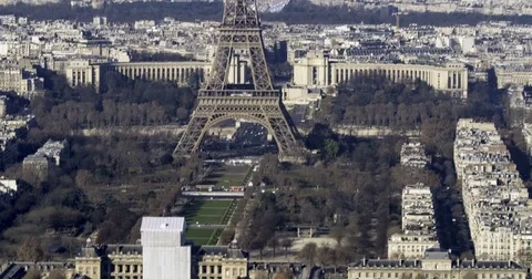 Tilt up arial time lapse view of the Eiffel tower in Paris Stock Footage 70794629