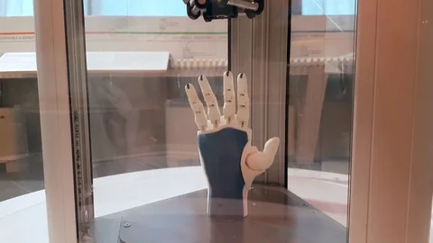 Tilt of artificial arm printed on 3D Printer Stock Footage 83702858