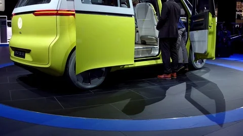Tilt up on autonomous VW self-driving van on display at Detroit Auto Show Stock Footage 71560743