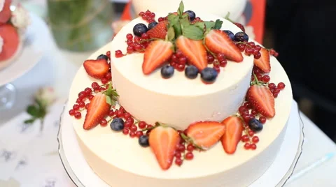 Tilt up of a beautiful wedding cake Stock Footage 61034711