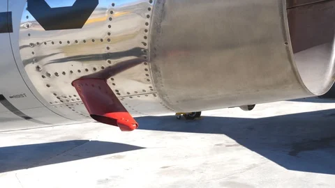 Tilt up to BEWARE of BLAST near engine of 1950s fighter jet. F-86 Sabre. Stockbeeldmateriaal 102144342