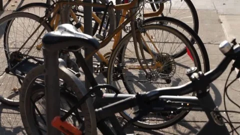 Tilt up bikes locked up Stock Footage 69186603
