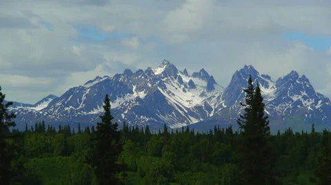 Tilt, Blue Sky, Fluffy Clouds, Forest and Mountains Stock Footage 37380961