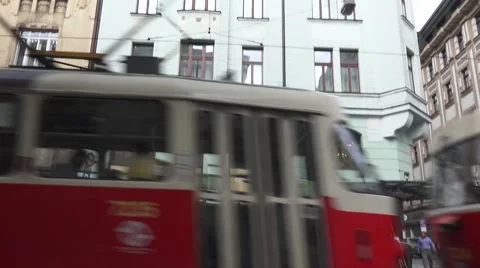 Tilt up to building while trolly passes Stock Footage 68348559