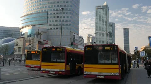 Tilt from buses to modern buildings outside Warsaw Central Station Stock Footage 59089487