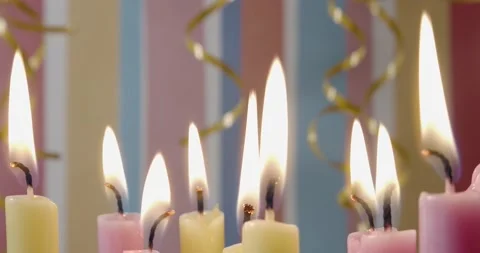 Tilt Camera to Burning Candles Stock Footage 231537095