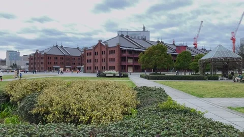 Tilt up camera movement of the red brick warehouse in Yokohama, in the minato Stock Footage 172424276