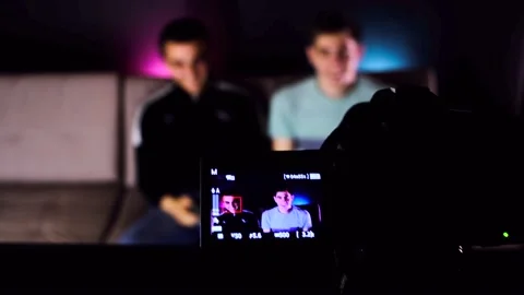 A tilt up camera shot of a camera record... | Stock Video | Pond5
