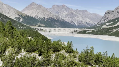 Tilt on Cancano Lakes dam - Engineering in Stelvio National Park Stock Footage 328413891