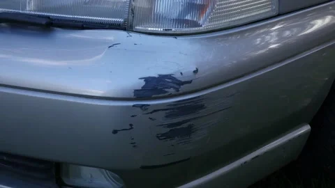 Tilt, Closeup: damages on corner of front bumper, Volvo S70 from 1997 Stock Footage 238530142