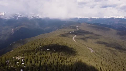 Tilt Up Cloudy Mountains Drone Stock Footage 131788308