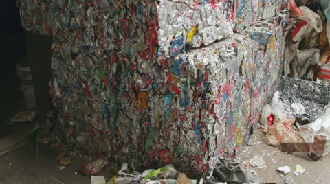 TILT UP ON COMPACTED ALUMINUM CANS Video stock 6526780
