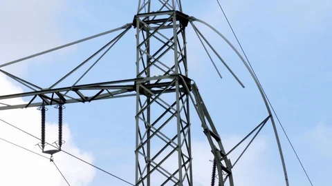 Tilt: Damaged power pylon, damage done to power tower crossarm, electricity 库存影片 128782426