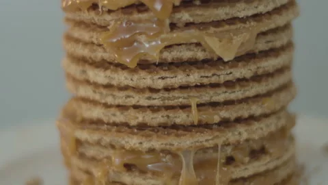 Tilt up of delicious stack of stroopwafels, a typical dutch cookie - Stock Footage 142778937