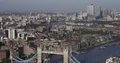Tilt Down Aerial View Establishing Shot of London Skyline Tower Bridge Landmark 4k or 4k+ Resolution